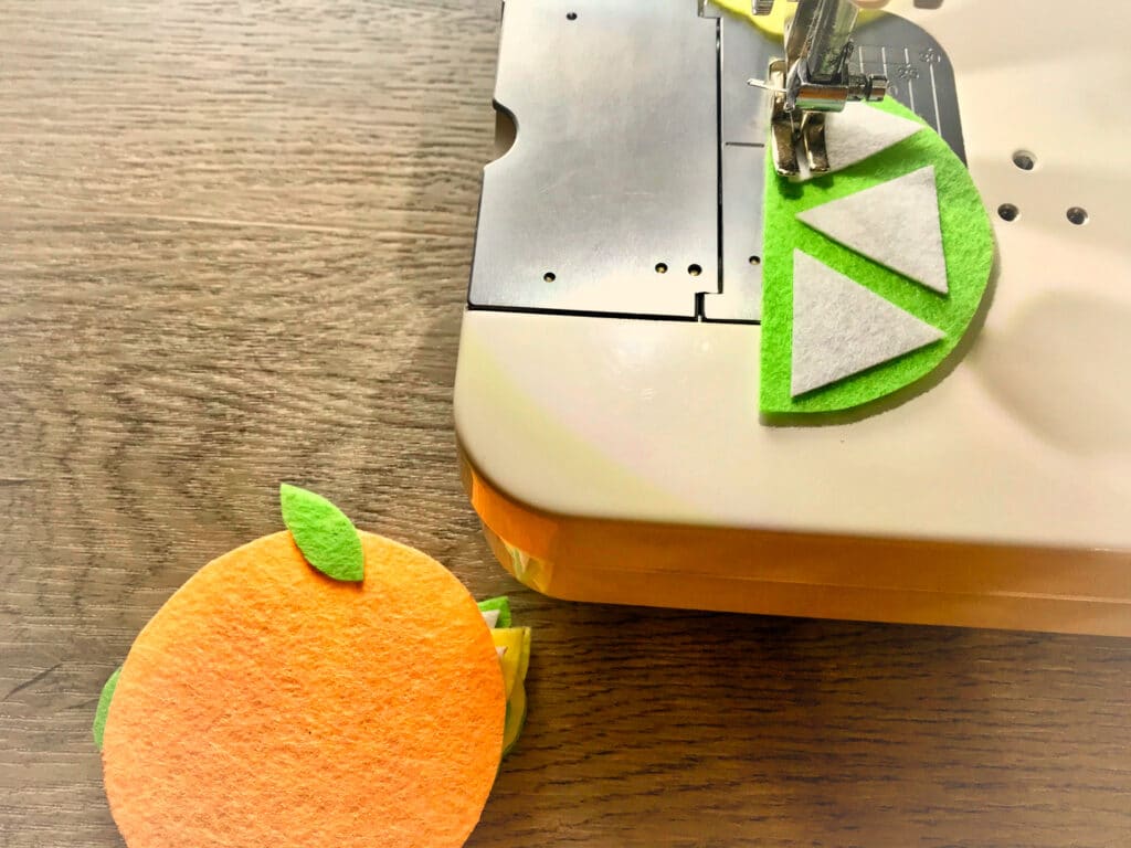sewing a felt lime fruit