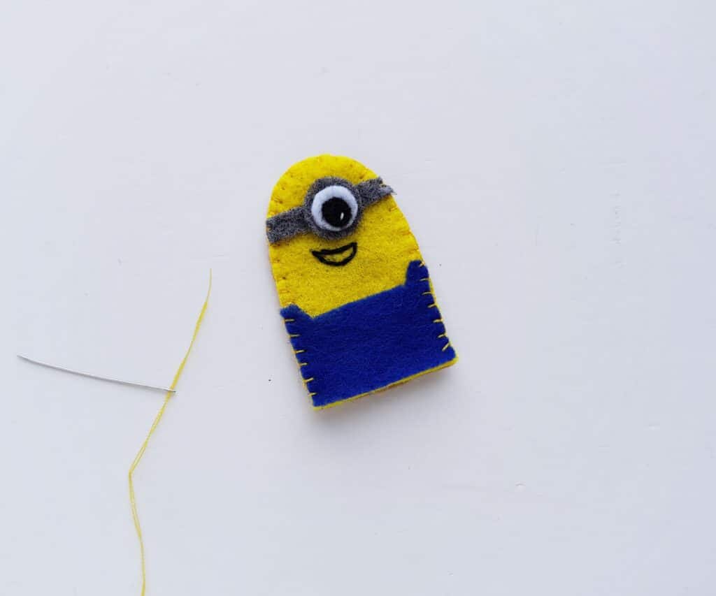 needle and thread next to felt minion