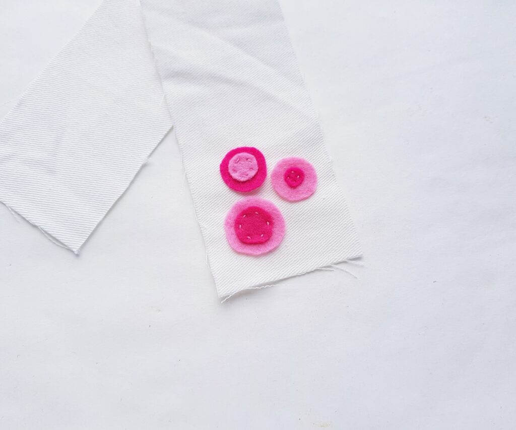 Fabric Bookmark with sewn pink and red accent dots