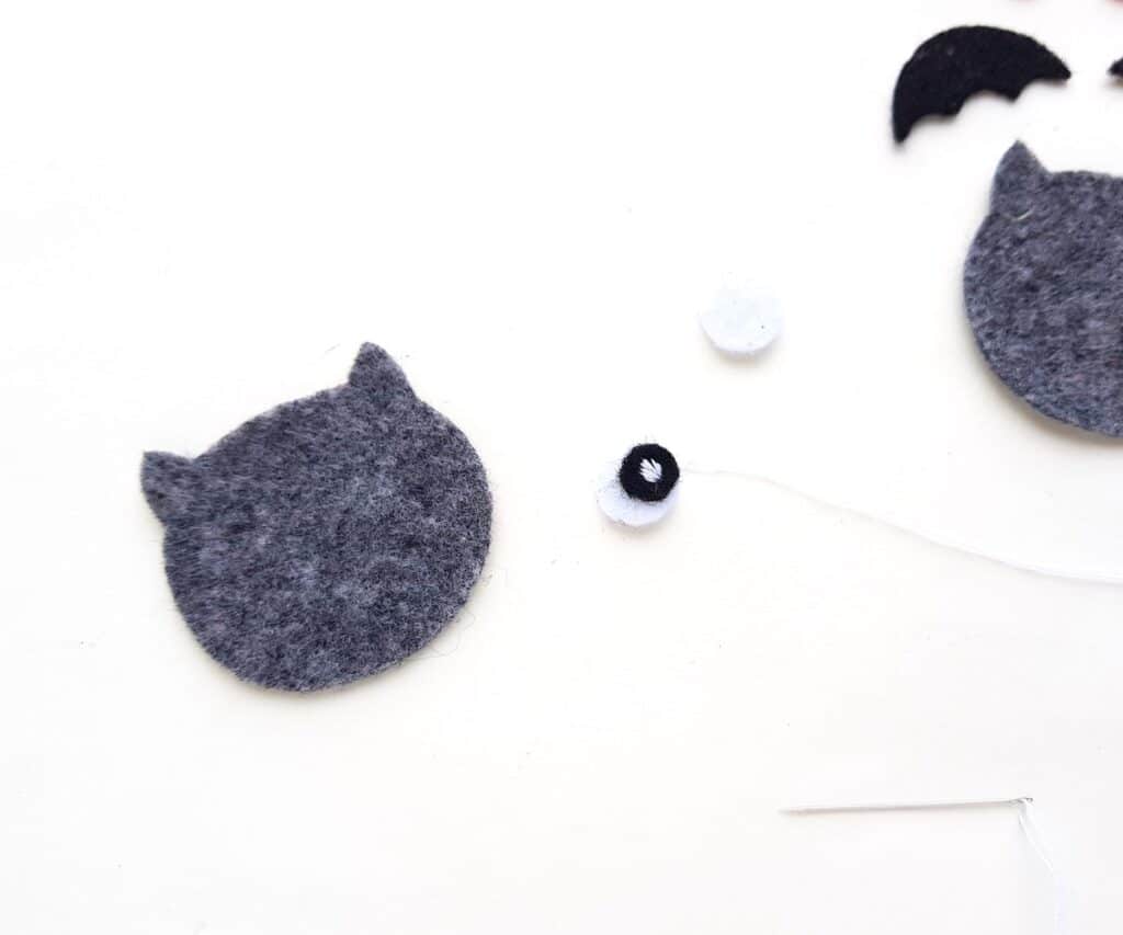 sewing facial features for a plush felt halloween bat