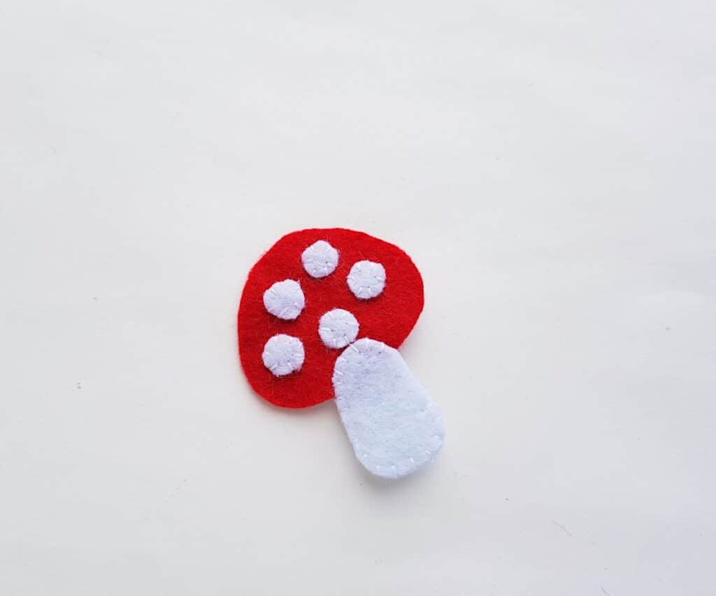 Felt Mushroom Plush front panel with sewn white dots