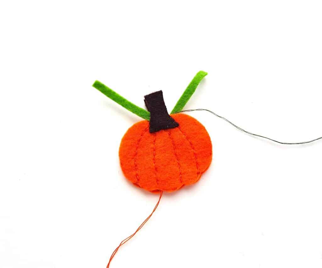 Cute Felt Pumpkin Plush sewing cutouts together