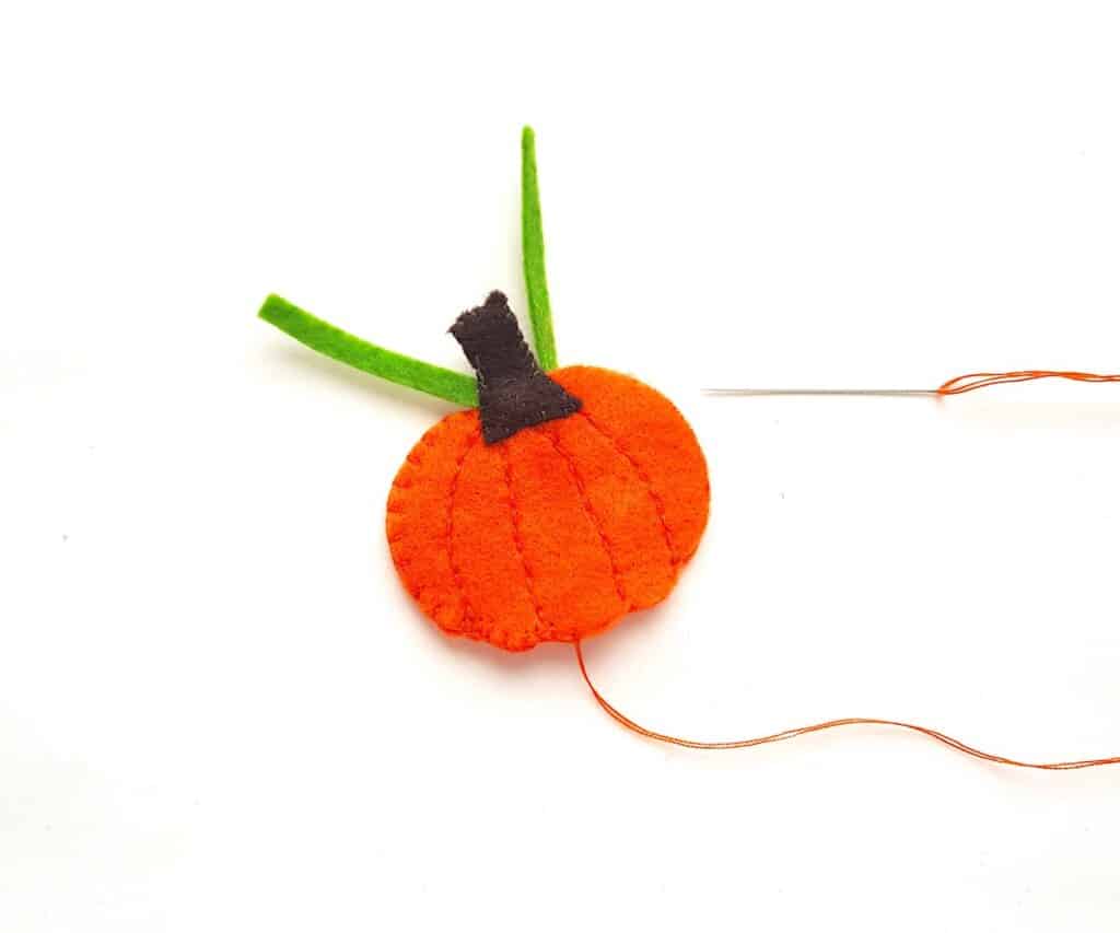 Cute Felt Pumpkin Plush sewing cutouts together