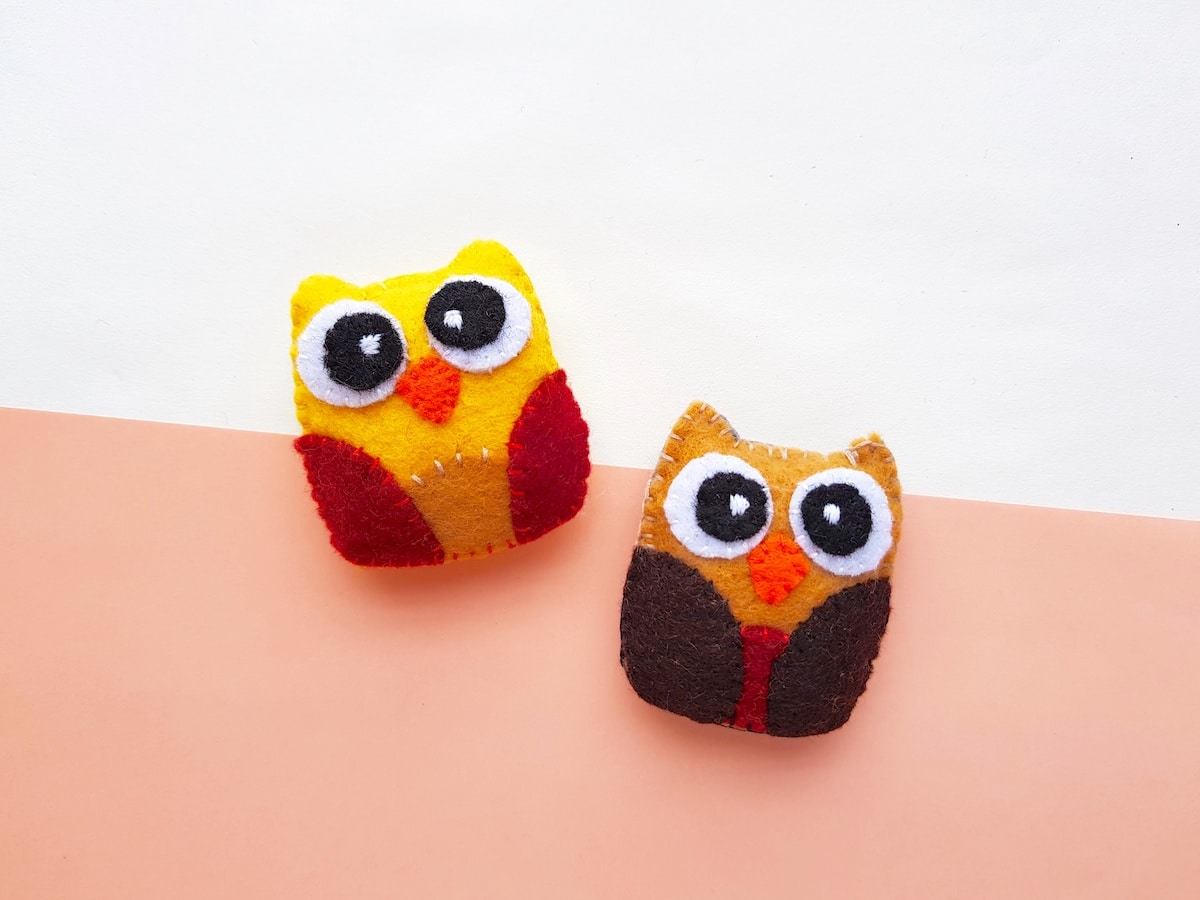 Felt Owl Plush closeup of two color schemes