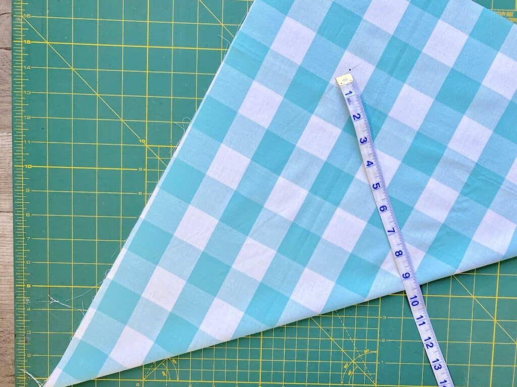 Measuring fabric on cutting mat