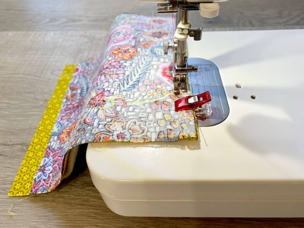 Sunglasses Case Step 3 fabric being sewn on sewing machine