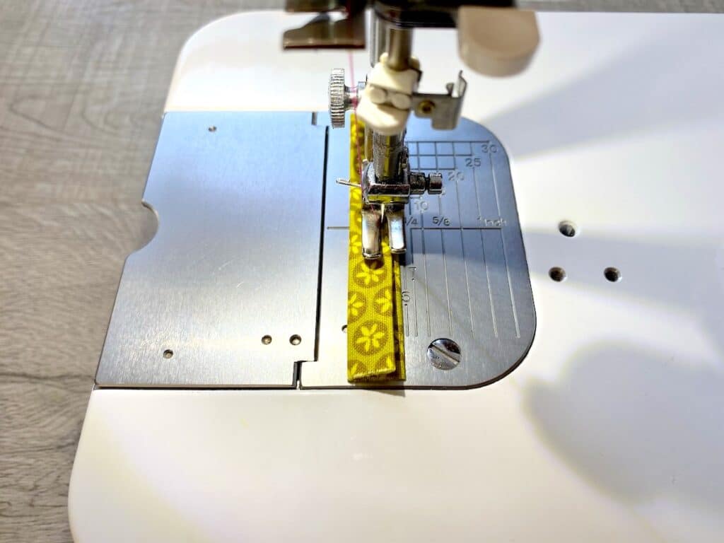 Sunglasses Case Step 6 being sewn on sewing machine