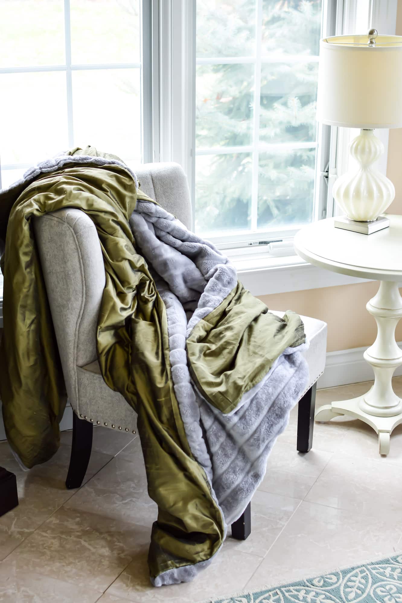 plush double sided blanket draped across back of living room chair