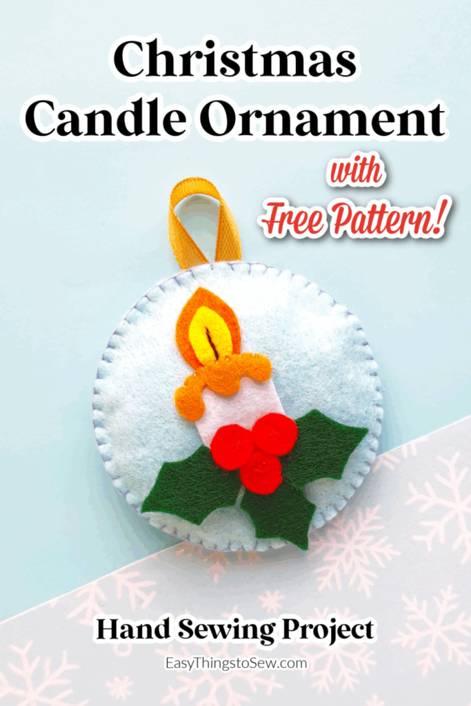Felt candle ornament with holly leaves, berries, and a yellow ribbon loop—perfect for hand sewing. Download the free pattern to craft your own festive Christmas candle ornament!.