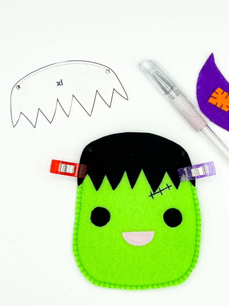 A felt Frankenstein hat with a candy pouch.