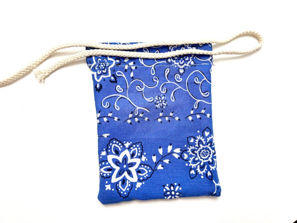 A blue crayon bag on a white background.