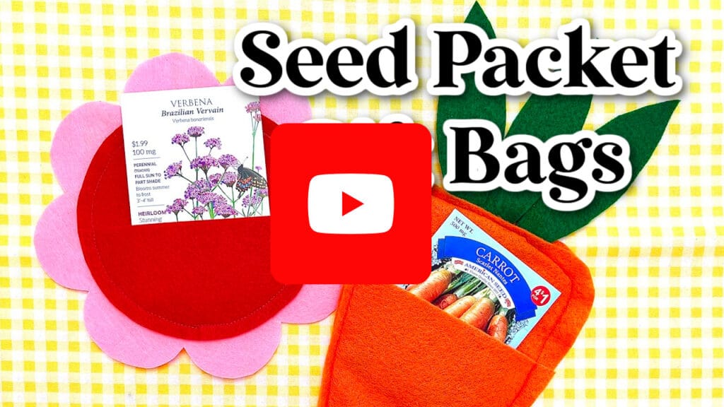 Two felt seed packet bags, shaped like a flower and a carrot, hold seed packets on a yellow checkered background. "Seed Packet Bags" and a YouTube play button overlay complete the scene.