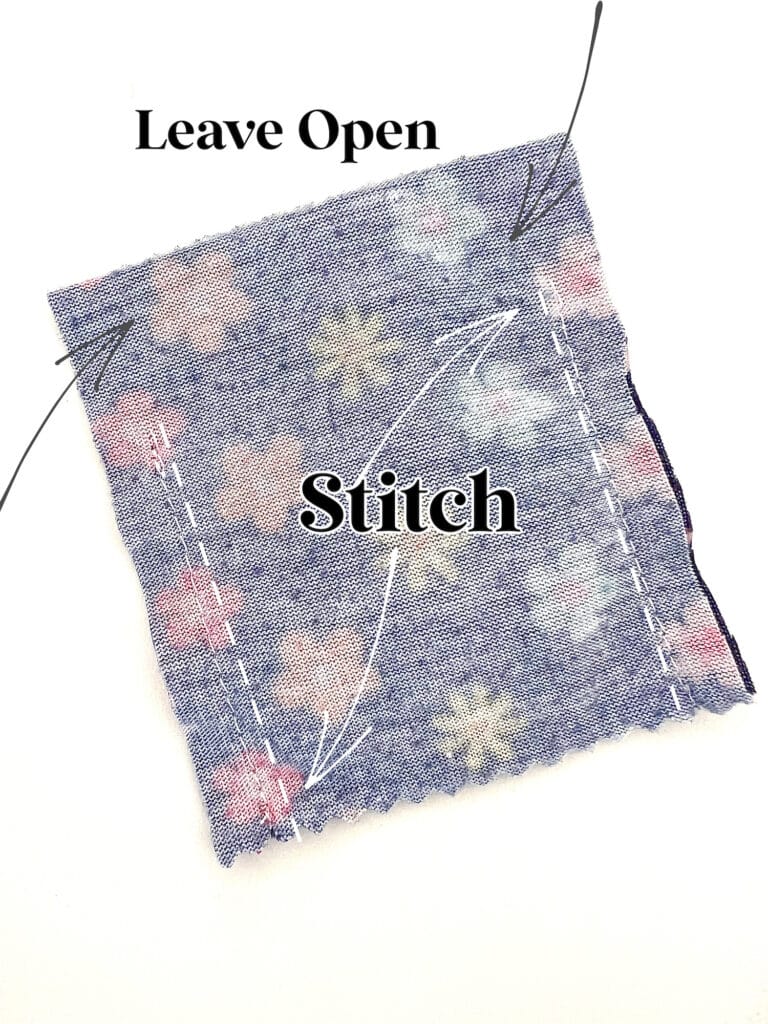 Fabric square with a floral pattern and zigzagged edges, featuring stitching lines for creating a Barbie shirt; remember to leave one side open.