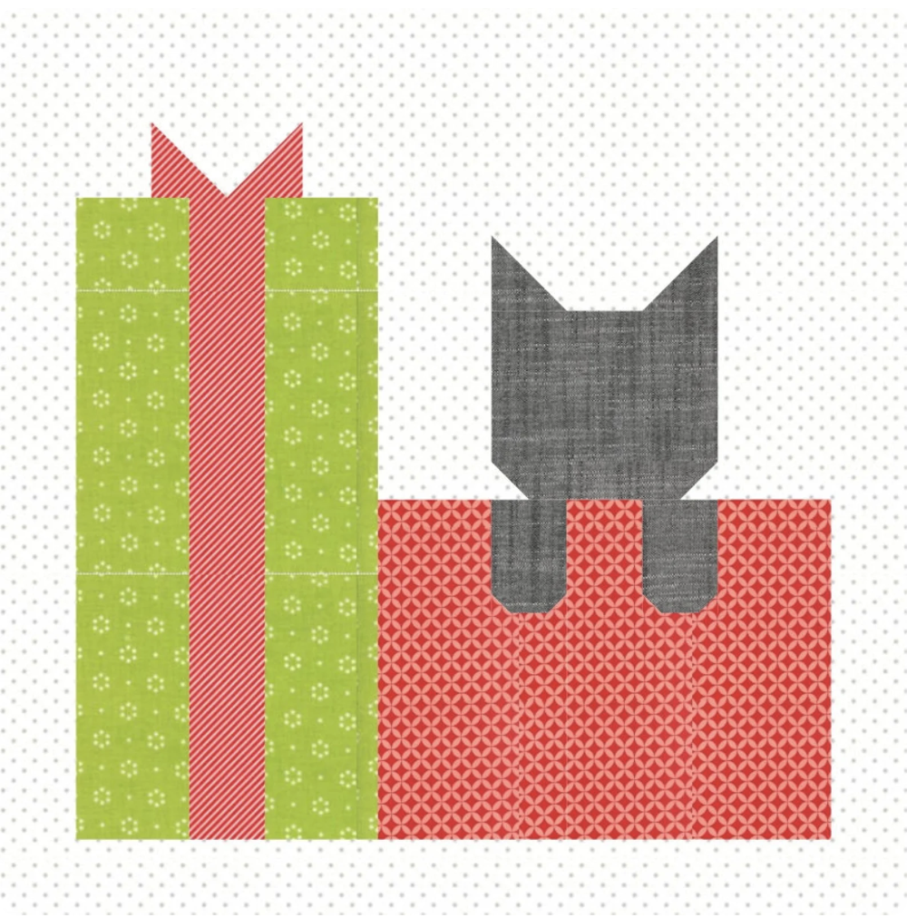 A fabric quilt block design featuring a green gift box with a red ribbon next to a red box with a gray geometric cat shape sitting on top.