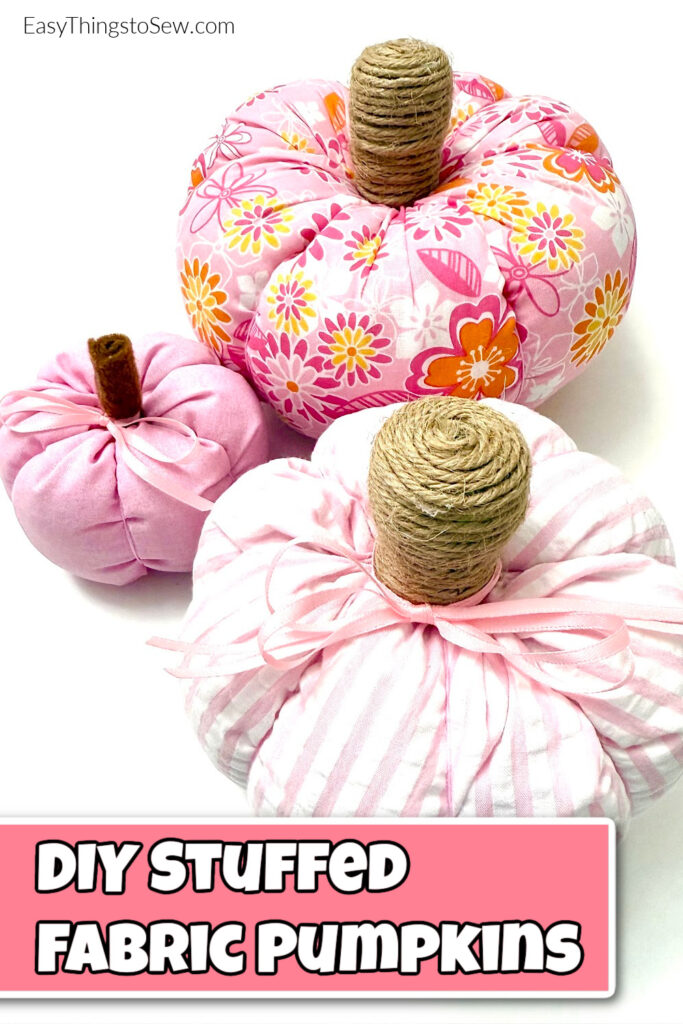 Three pink stuffed fabric pumpkins with twine-wrapped stems are displayed on a white background. Text reads: "DIY Stuffed Fabric Pumpkins.