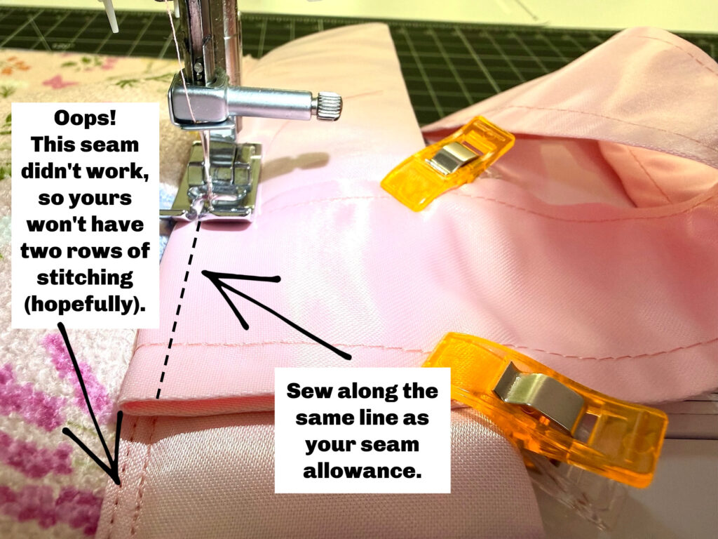 A close-up of fabric for a dish mat tote bag being sewn with a machine, showing sewing clips and text noting an incorrect seam with two stitching rows, plus guidance to sew along the seam allowance line.
