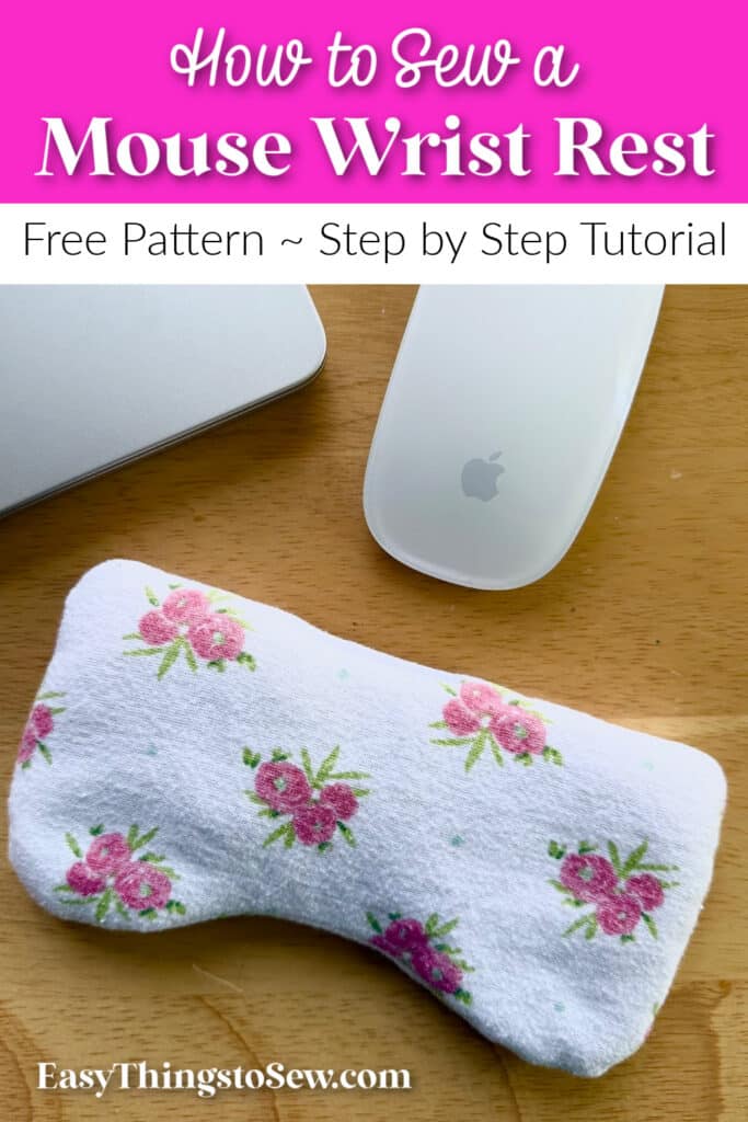 A handmade fabric mouse wrist rest with a floral pattern is placed next to an Apple computer mouse on a wooden surface. Text on the image advertises a sewing tutorial.
