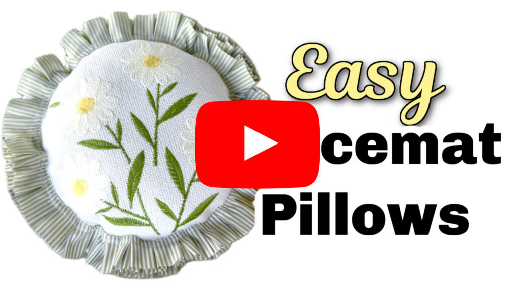 DIY placemat pillow with embroidered daisies and green and white striped ruffle edge next to text "easy placemat pillows" with a red Youtube play button overlapping text and pillow